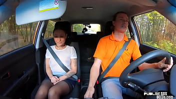 Petite student driver publicly sucking her instructor
