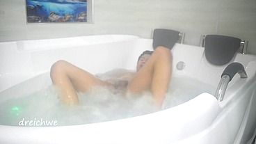 Taking a bath in the tub