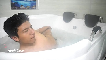Taking a bath in the tub