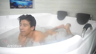 Taking a bath in the tub