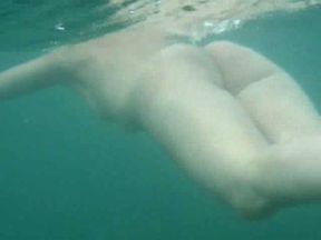 My beautiful wife swims underwater and her butt muscles work