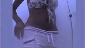 Beautiful girl rubbing wet cherry sensually