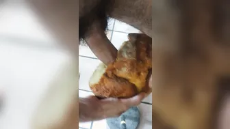 Young hunk masturbates and cums inside a loaf of bread
