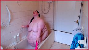 SSBBW Lady Brads has fun in the bath with dildos