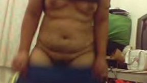 Chubby white slut undresses on webcam to flash her stinky goodies