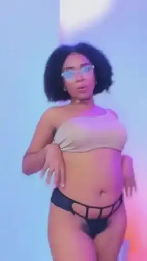 Enjoy this captivating performance that showcases her alluring moves and mesmerizing presence.