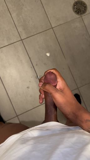 Big black cock shooting ropes in public bathroom