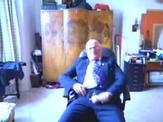 Older men shoot on his suit