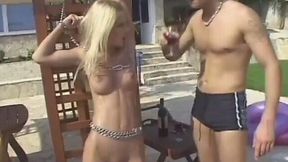 Cute chained young blondie is fed with cock and fucked