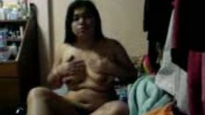 BBW girlfriend from Philippines rubs her fat hairy pussy in bedroom