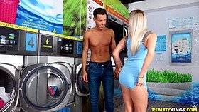 Busty blonde in the laundry room