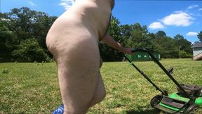 Jon Scarecrow completely naked  in cowboy boots push mowing the grass