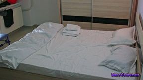 Jeans sitting and jerking him with her hand