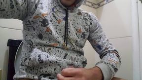 Young man jerks off with clothes