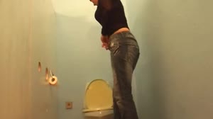 Brunette is shocked when a dick is a glory hole