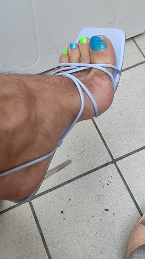 Sexy man feet in heels