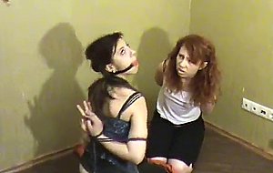 Ball and ring gagged slaves in reverse prayer kiss