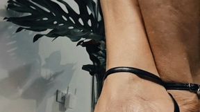 Milah Sexy Heel Popping off her black sling back pumps