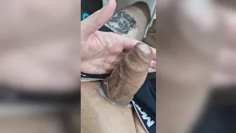 Uncut twink strokes his big cock and shoots a thick load