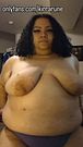 Playing with and shaking massive DD tits
