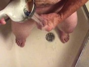 I was so hard while shaving in the shower, started to masturbate and used the water jet to cum