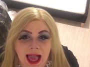 Sexy blonde crossdresser plays with cum
