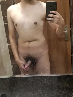 Big dick masturbating in public restroom