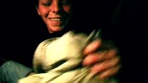 Brunette Fingers Herself Deep in Dark Car