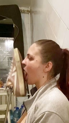 Licking shoe soles from fuck machine