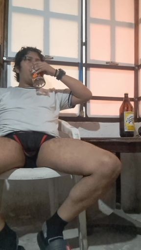 Drinking beer.