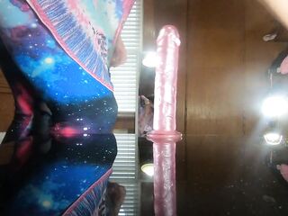 Trans doxy Daphne bangs herself on the table with her pink sex toy