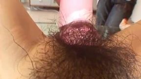 Intense Stimulation of Yuri's Pussy as She Lies on a Glass Table