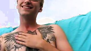 Amateur tattooed twink fingers his ass and masturbates solo