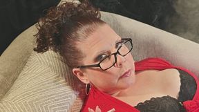 Sitting back in my red robe and black lacy bra smoking VS 120, teasing once again