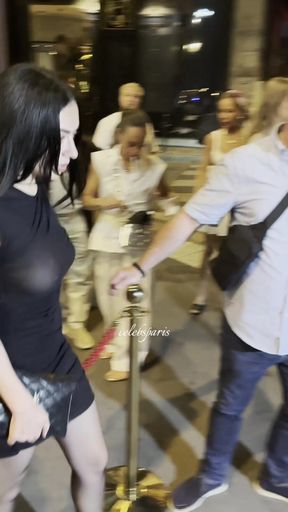 Curvy celebrity shows off her big tits in see-through clothes