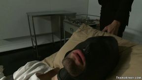 ”Shemale scientist fucks man in gimp mask”