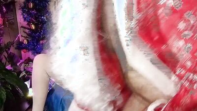 Cock hungey babe gives some juicy bj to a Santa Clause