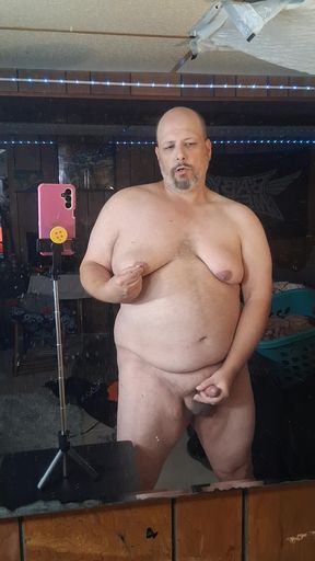 Chubby guy stands and cums