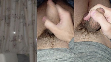 Vigorous masturbation of a large tattooed penis under New Year's fireworks