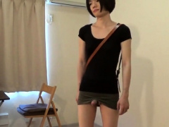 crossdresser wearing a mini skirt