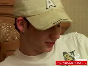 Seductive Smoking Twink Indulges in Sensational Threesome