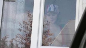 MILF gets a hand job by the taxi driver while naked in public