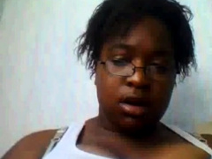Ebony shows big tits on webcam