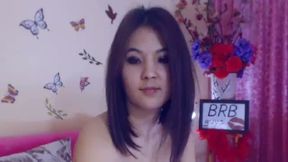 Asian Brunette Kim Hearts is Stripping and Enjoying Her Time