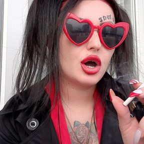 Sexy smoking fetish from Dominatrix Nika. Mistress smokes 2 cigarettes and blows smoke in your face. Sexy red lips