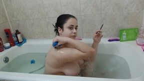Smoking in bathtub - relaxing moment