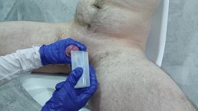 The nurse thoroughly massaged the patient's testicles and penis to collect sperm for analysis.