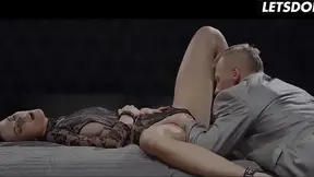European babe kneels for sloppy blowjob in black lace bodysuit