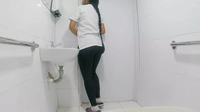 Amateur camera in public bathroom captures nurse pissing(public)