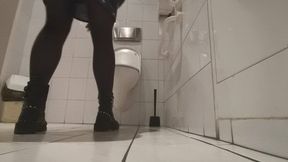 Removing boots while toilet visit - only sexy tights on legs